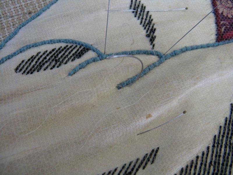 Detail of stitching thee net in place.