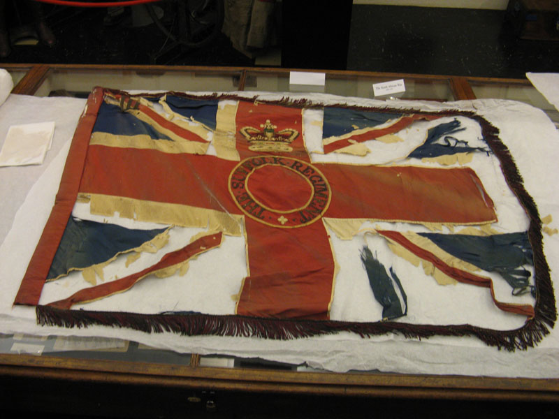 The Queen's Colour with the silk being realigned.