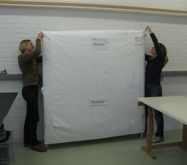 The banner arriving at the studio fully packed.