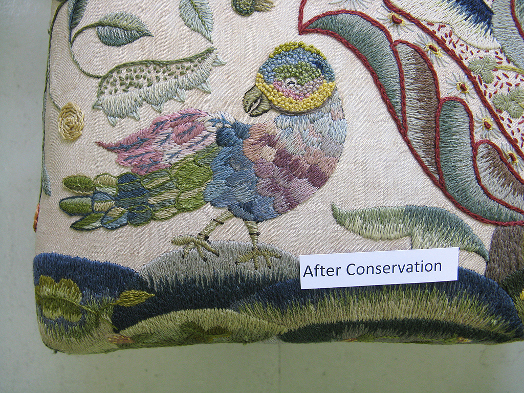 Detail of the stool cover after the reduction of the water stains.