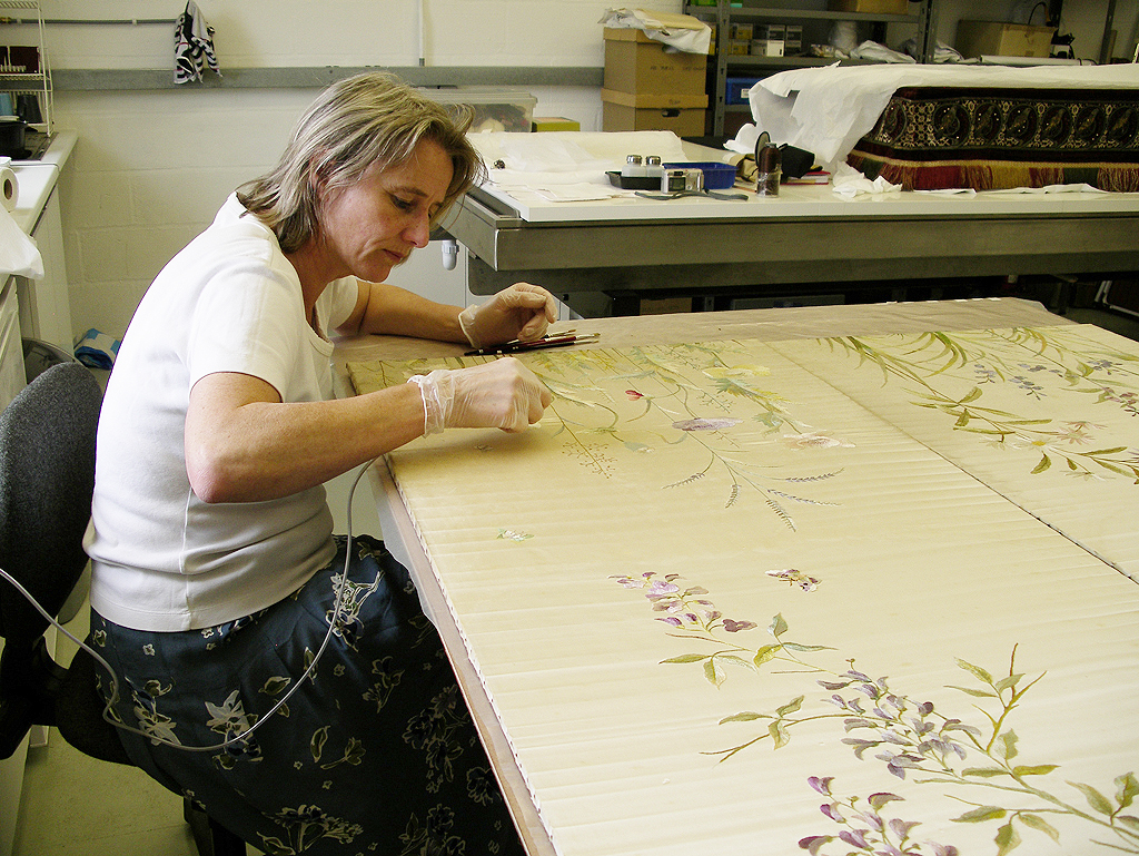 Reducing the water stains on a the silk embroidered panel of a Screen.