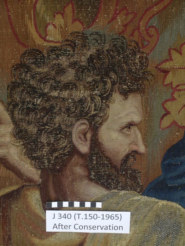 A detail of one of the faces after conservation treatment