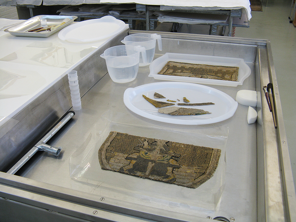 Copehood fragments prepared for wet cleaning.