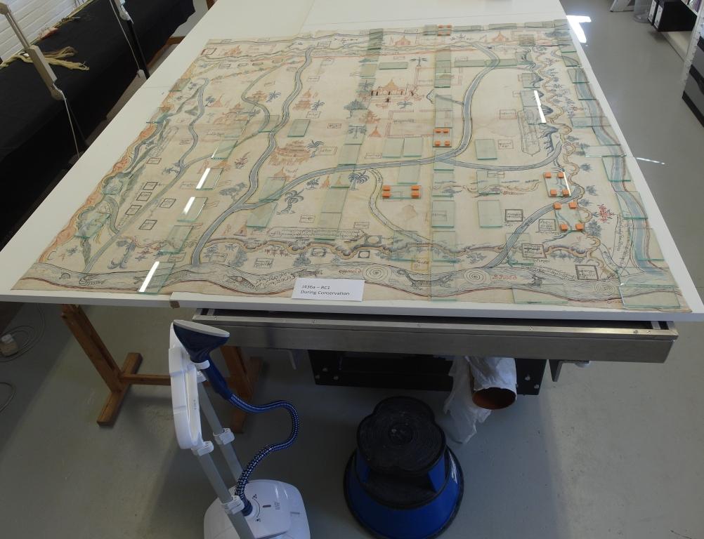 Hand-painted Burmese Map (Maps.Ms.plans.Rc.1) during Conservation. Humidifying process to ease the creases