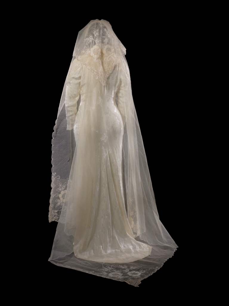 Back view showing the veil of Mrs. Albertson's wedding dress