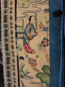 6. Detail of blue embroidered silk robe, AC web